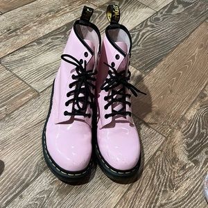 pastel pink doc martens.